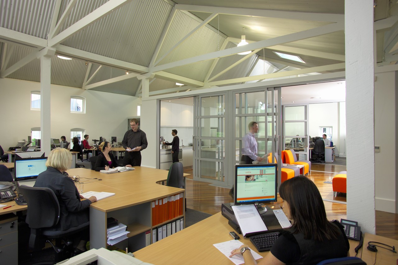 Interior view of the Enabling offices which feature institution, office, gray