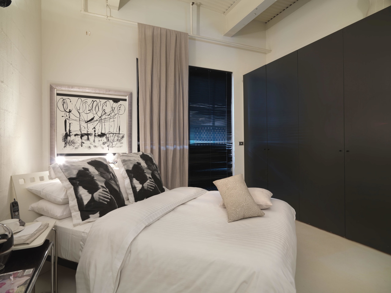 View of bedroom with light-stained timber flooring, corrugated bed frame, bedroom, ceiling, floor, home, interior design, property, real estate, room, suite, wall, window, gray, black