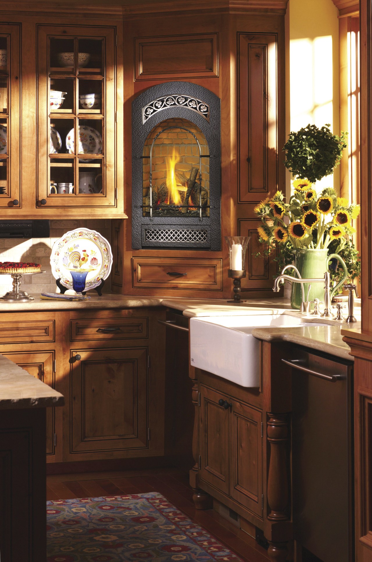 View of a portrait-styled fireplace by Fireplace Xtrordinair. cabinetry, countertop, fireplace, furniture, home, home appliance, interior design, kitchen, kitchen appliance, living room, room, brown