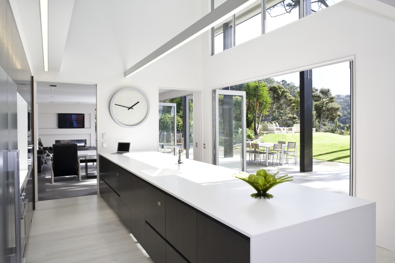 View of kitchen featuring large island, dark-stained oak architecture, house, interior design, kitchen, real estate, window, white