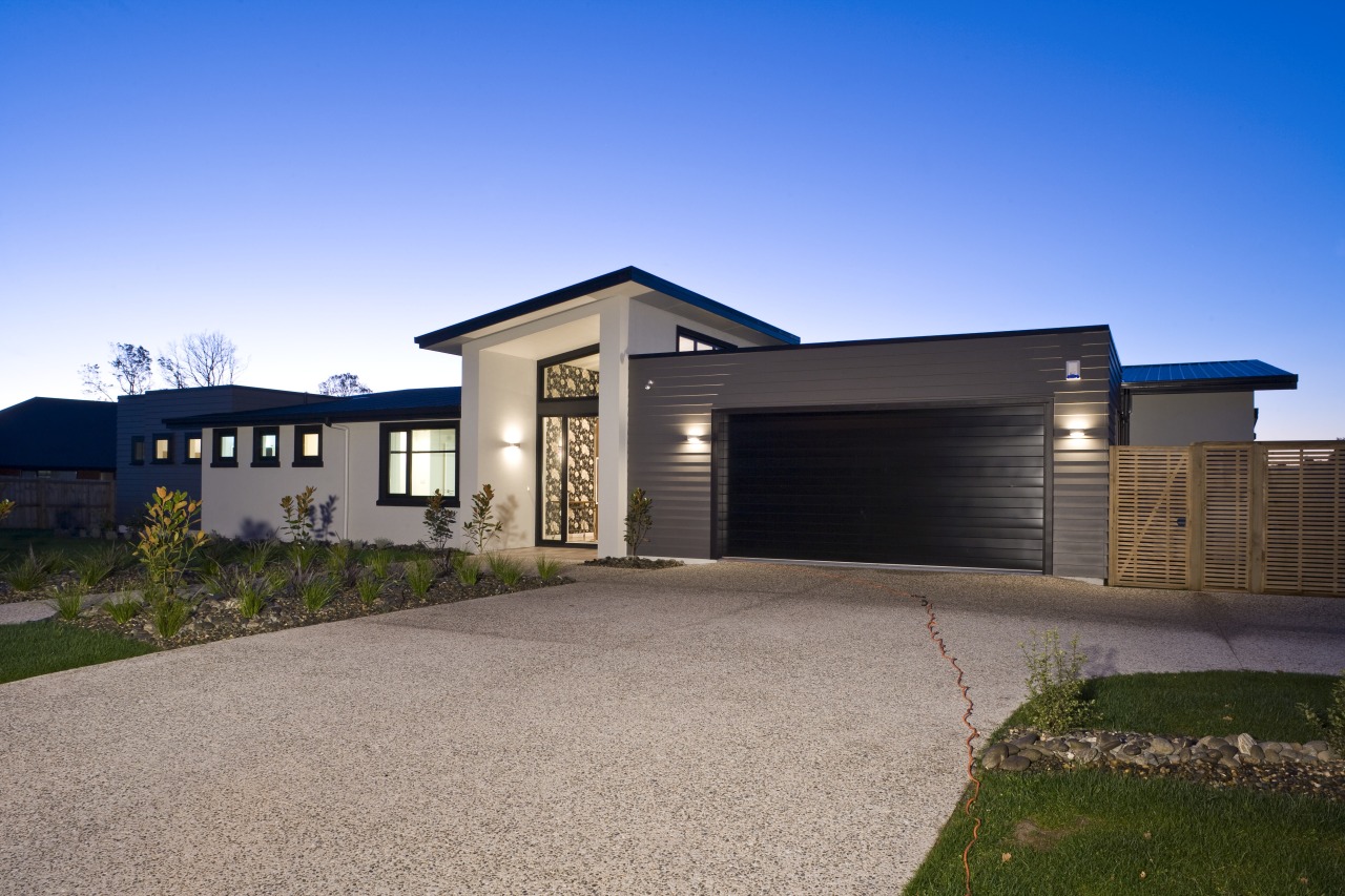 Exterior view of a David Reid Homes show architecture, building, elevation, estate, facade, home, house, property, real estate, residential area, sky, teal