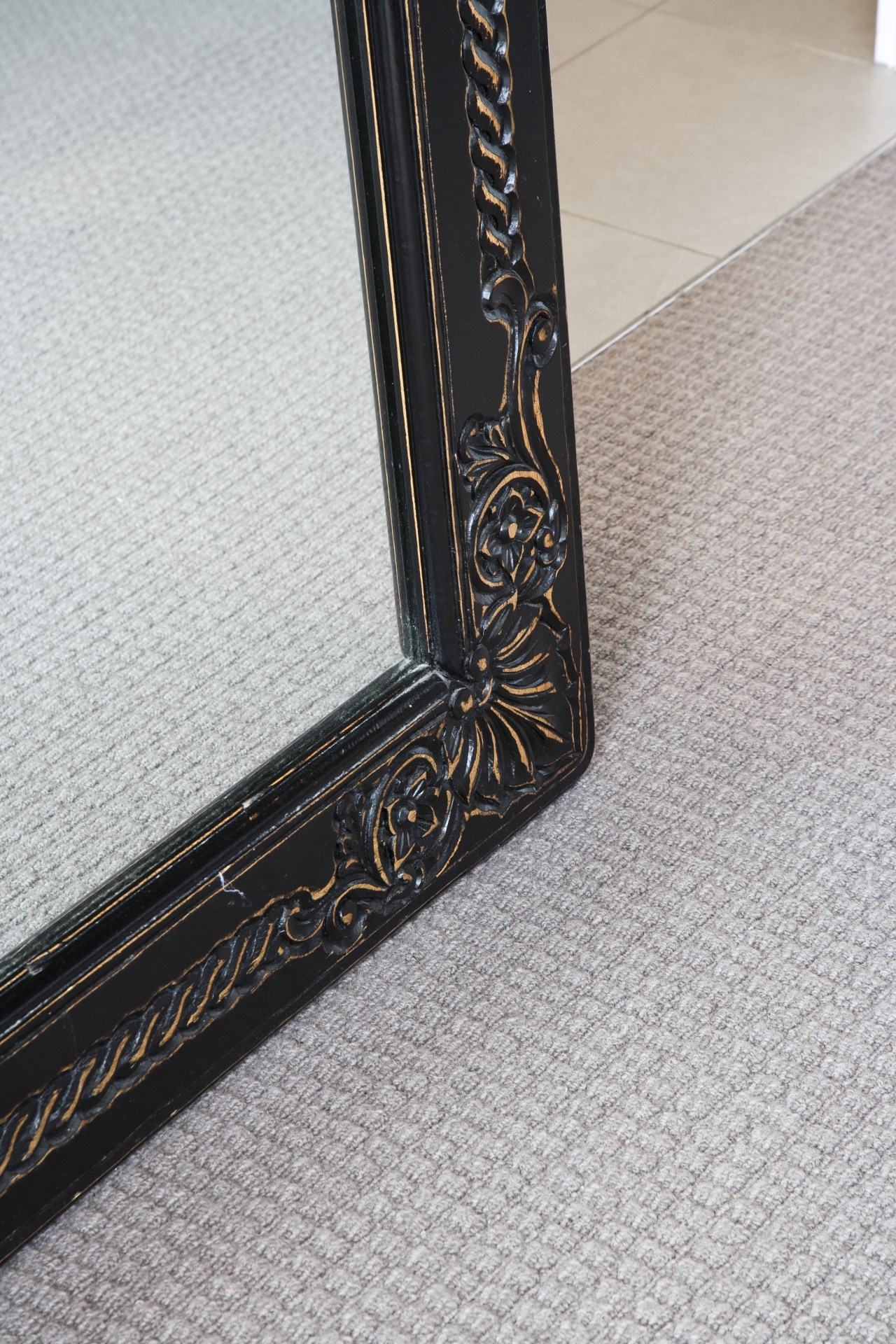 View of a bedroom area which features pure floor, flooring, wood, gray