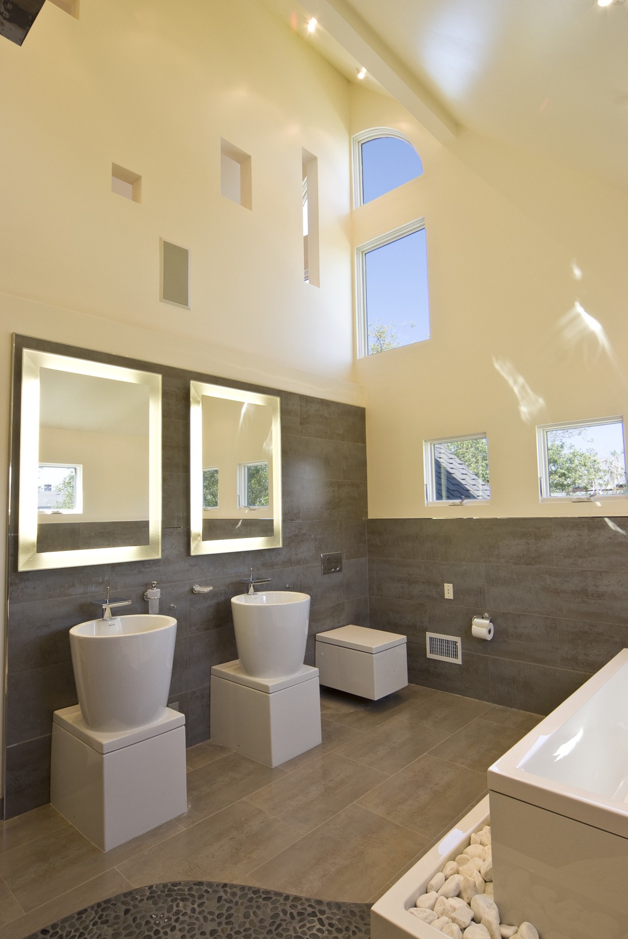 View of the bathroom of this canal-side residence architecture, bathroom, ceiling, daylighting, estate, floor, flooring, home, interior design, living room, real estate, room, sink, tile, orange, brown