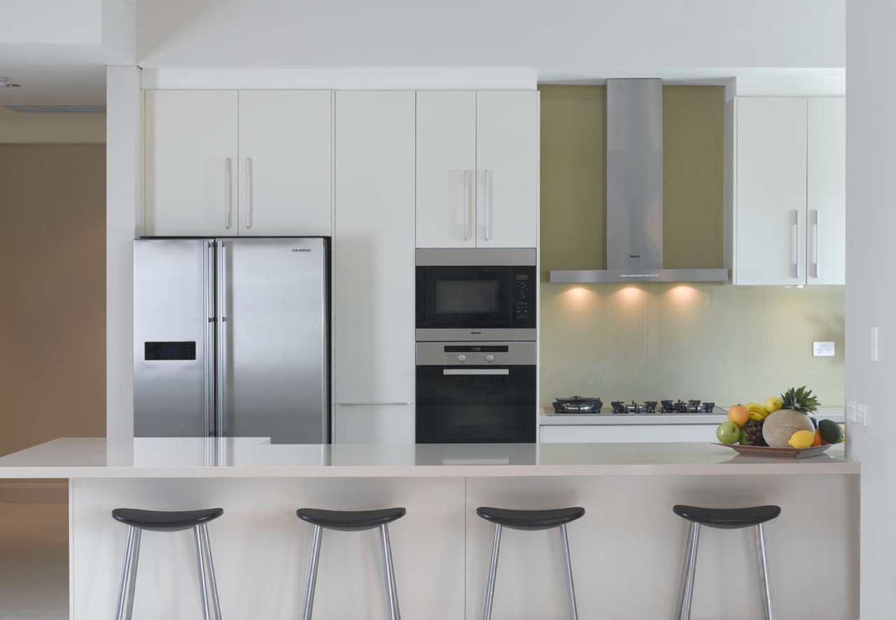 View of an apartment kitchen at the Lindfield cabinetry, countertop, cuisine classique, home appliance, interior design, kitchen, kitchen appliance, kitchen stove, major appliance, product design, refrigerator, small appliance, gray