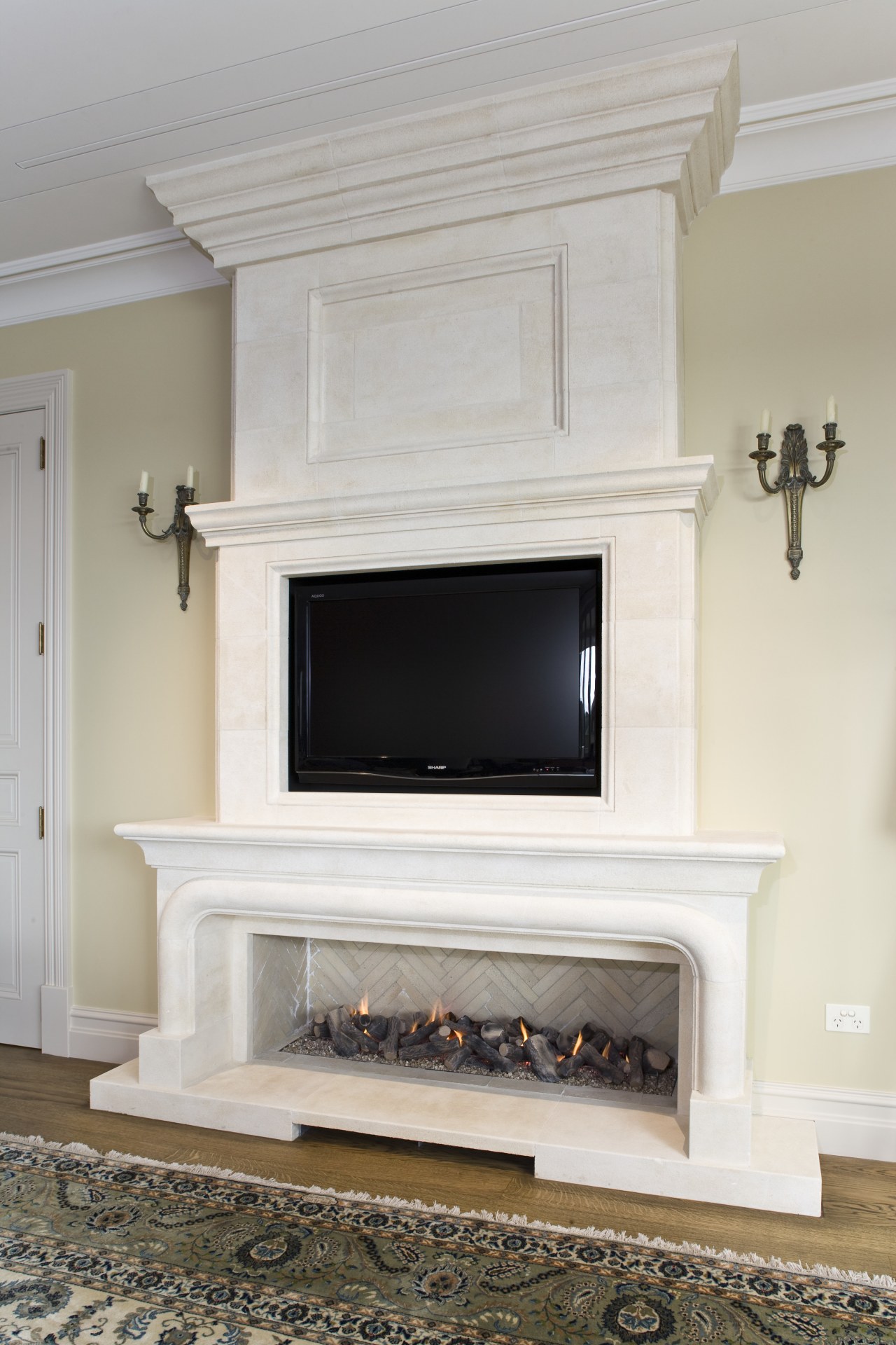 View of a hand-crafted stone mantle by The fireplace, furniture, hearth, home, living room, gray