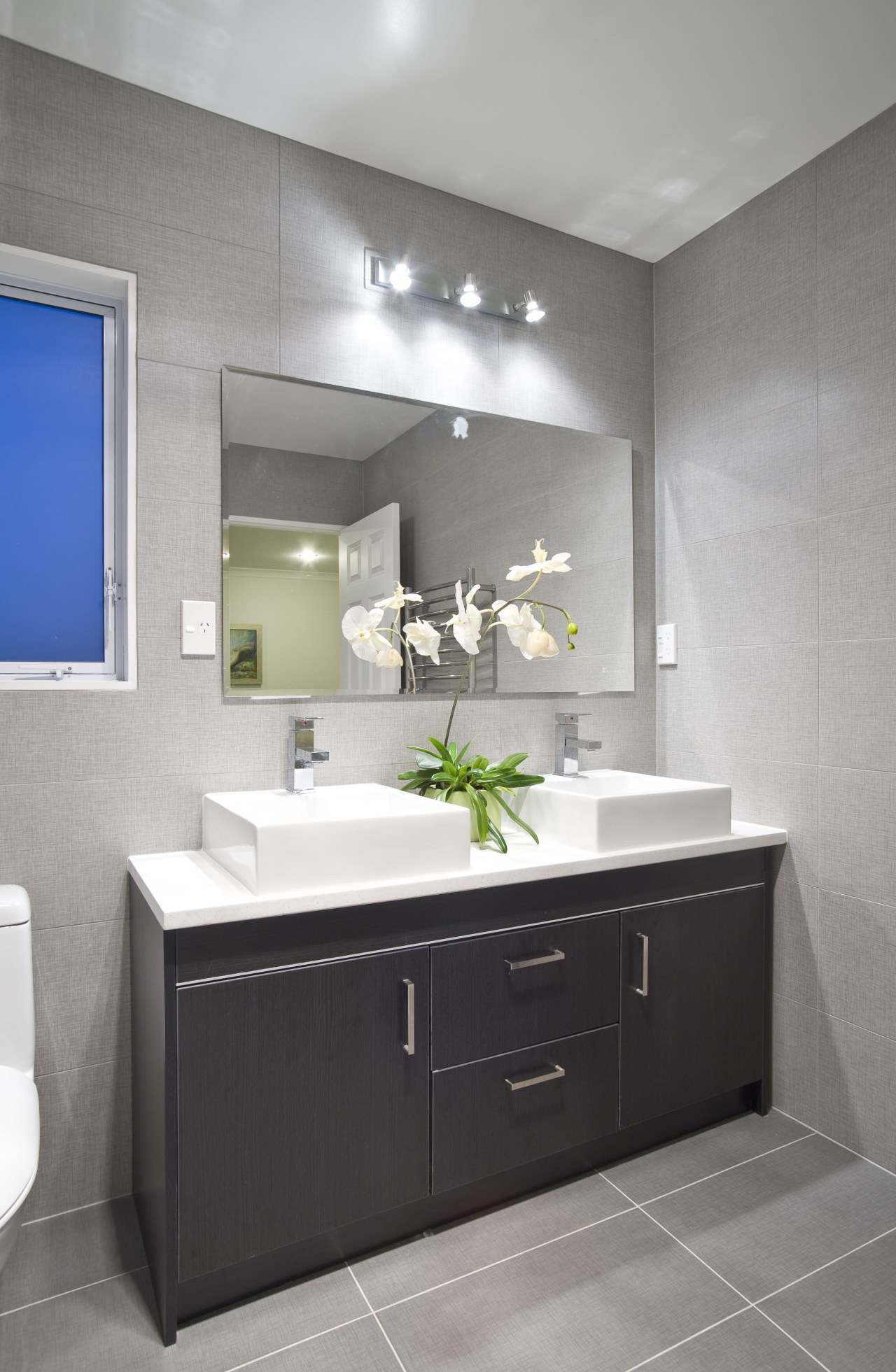 View of a bathroom with a oak veneer bathroom, bathroom accessory, bathroom cabinet, interior design, product design, room, sink, gray