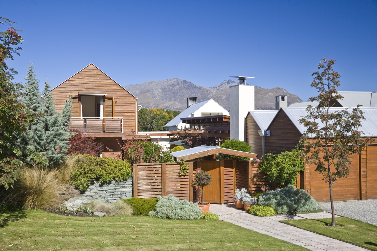 Exterior view of home which is clad with cottage, elevation, estate, facade, home, house, landscape, landscaping, neighbourhood, property, real estate, residential area, roof, siding, suburb