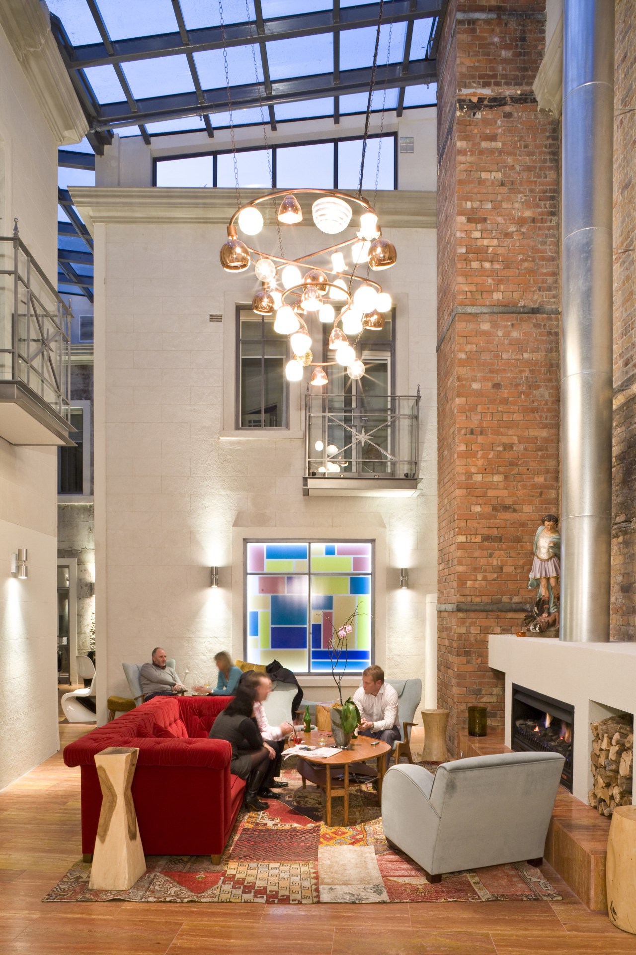 View of the atrium with pieces of red ceiling, home, interior design, living room, lobby, loft, orange, gray