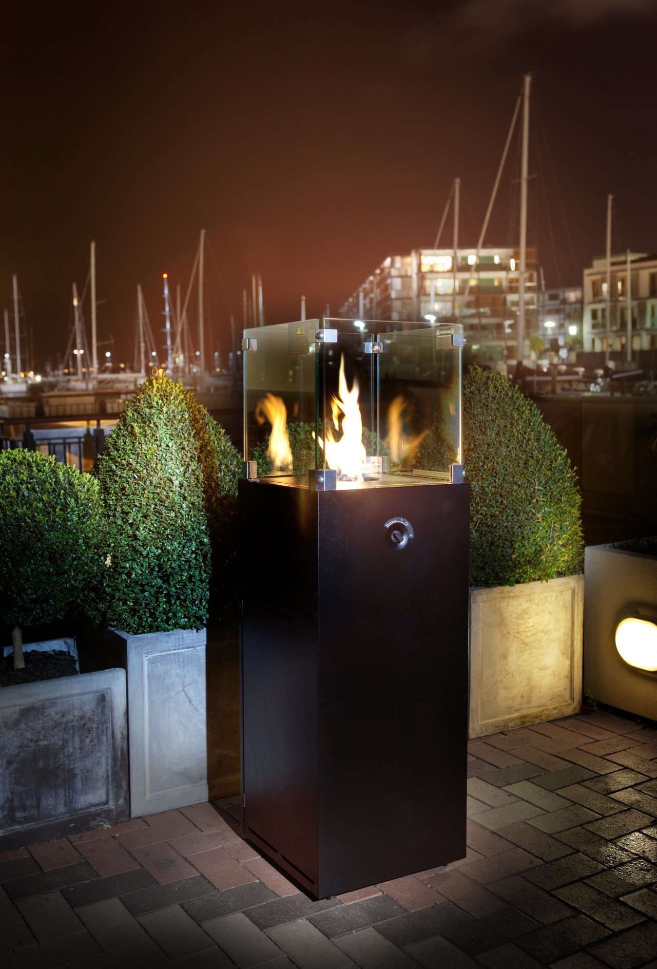 view of the freestanding outdoor flare; Illuminate available lighting, night, reflection, red, black, brown