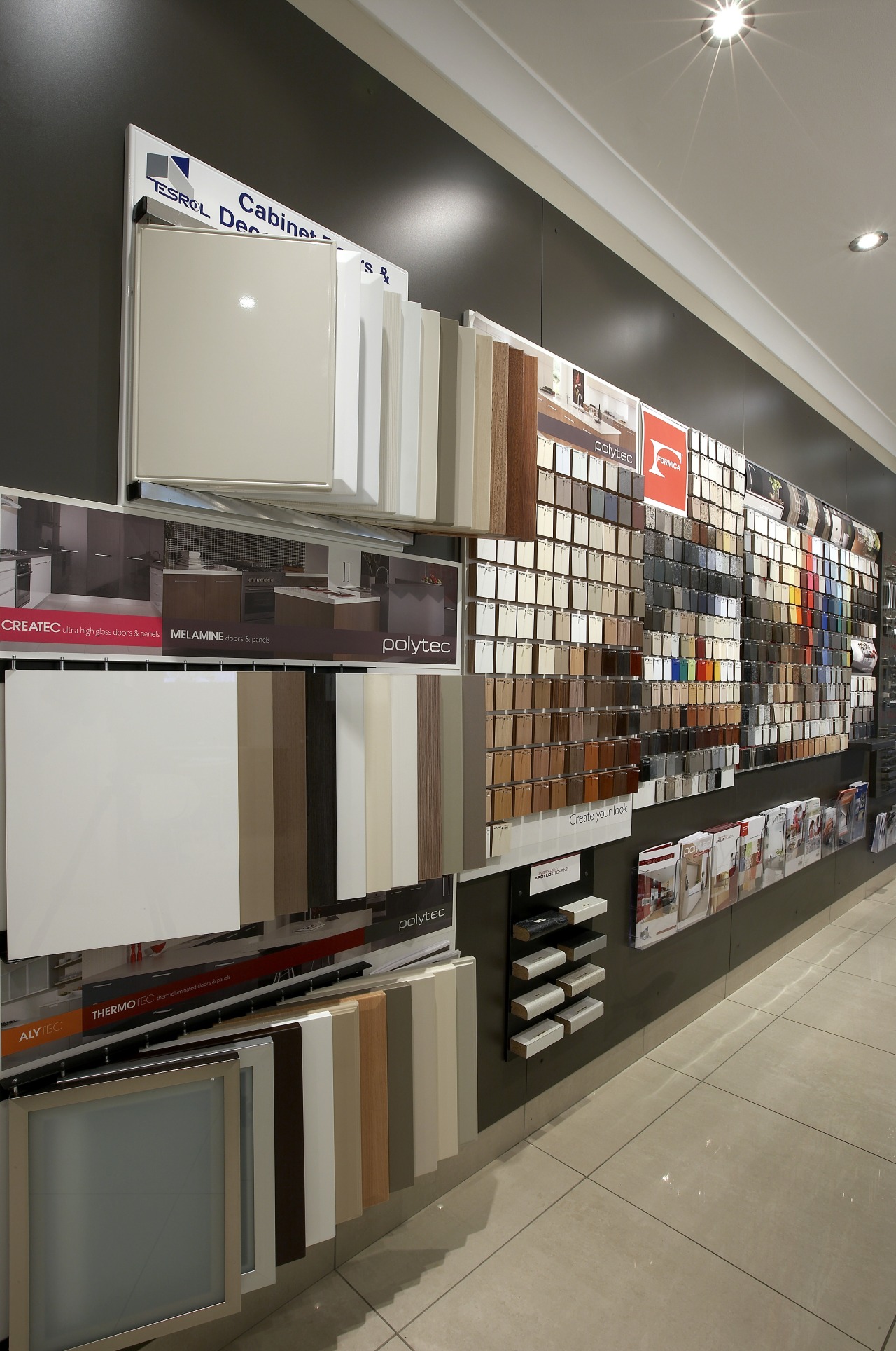 View of an Apollo Kitchens showroom which showcases interior design, retail, shelving, gray, black