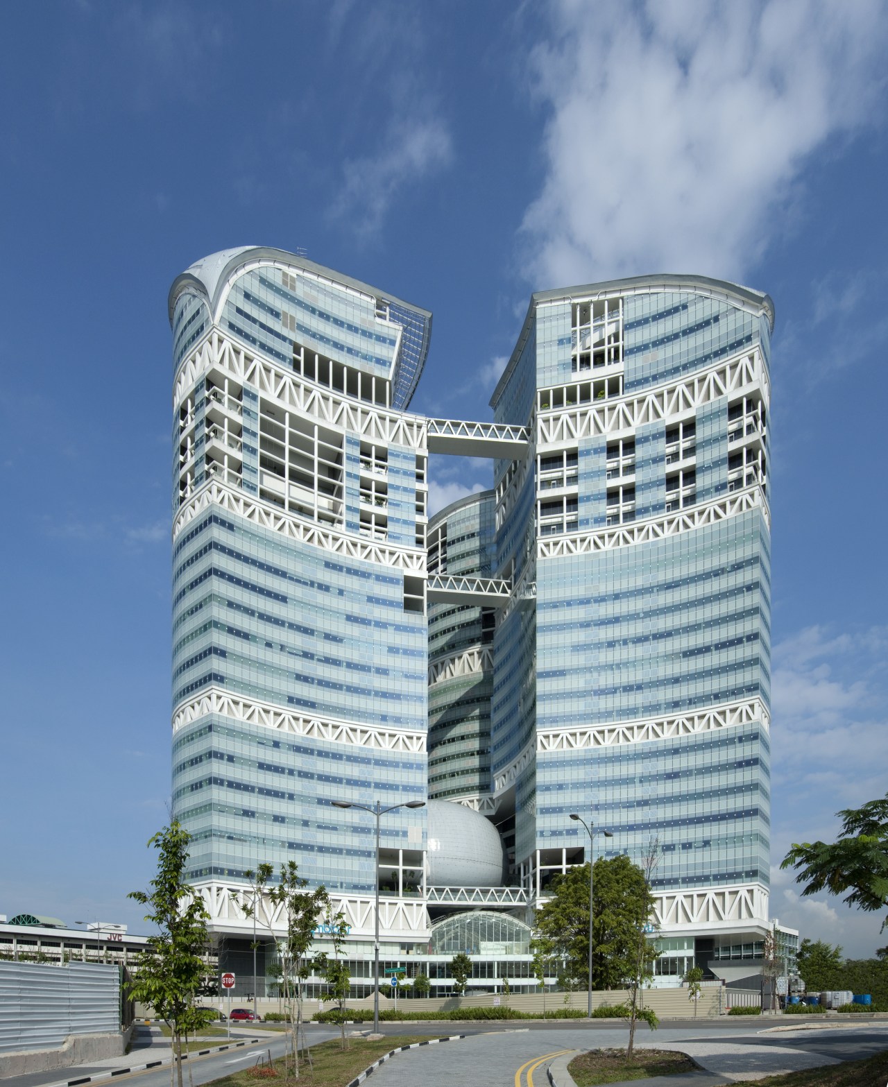 Exterior view of the Fusionopolis commercial/residential tower which architecture, building, commercial building, condominium, corporate headquarters, daytime, headquarters, landmark, metropolis, metropolitan area, mixed use, sky, skyscraper, tower, tower block, blue, gray, teal