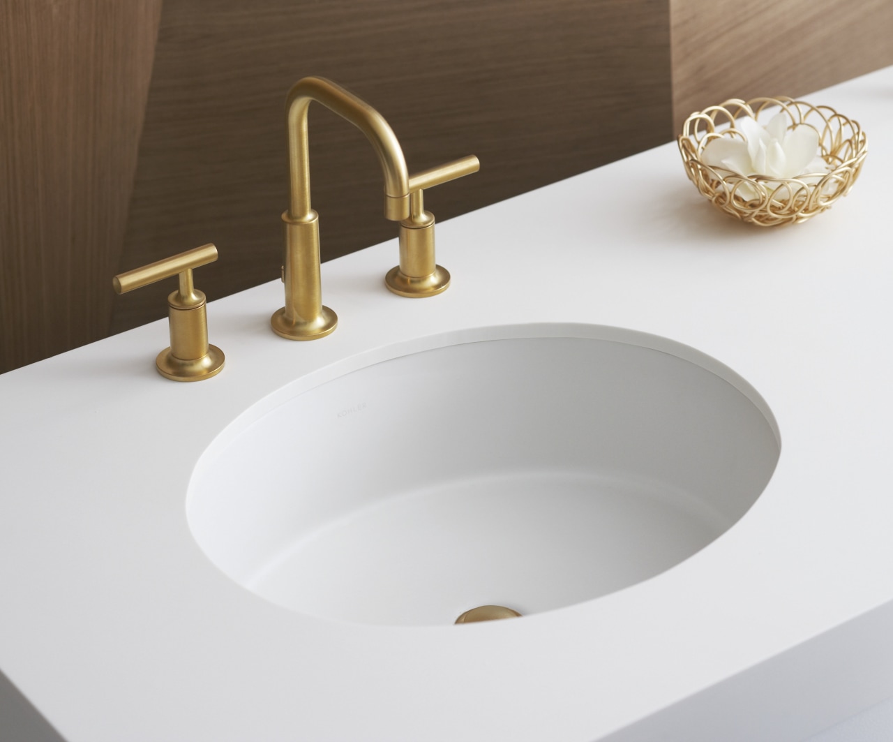 View of a Kohler basin with gold faucets bathroom sink, ceramic, plumbing fixture, product design, sink, tap, white, brown