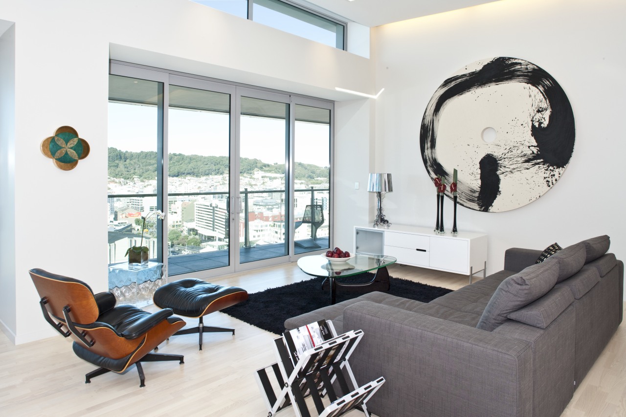 interior view of an apartment living room featuring furniture, home, interior design, living room, room, table, window, white