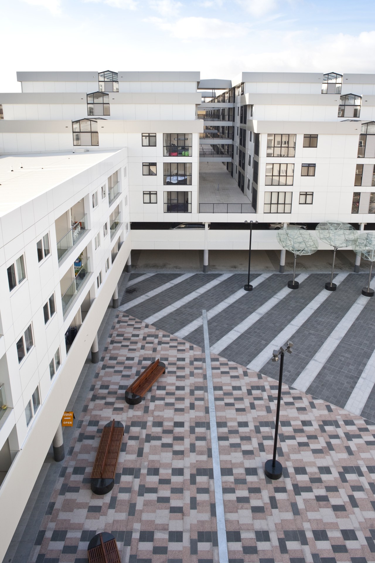 Exterior view of kings square and queens lodge apartment, architecture, building, condominium, facade, mixed use, property, residential area, roof, urban design, gray, white