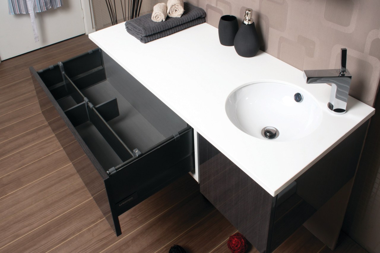 View of a bathroom with a vanity from angle, bathroom, bathroom cabinet, bathroom sink, ceramic, countertop, floor, furniture, interior design, plumbing fixture, product design, sink, tap, black, white