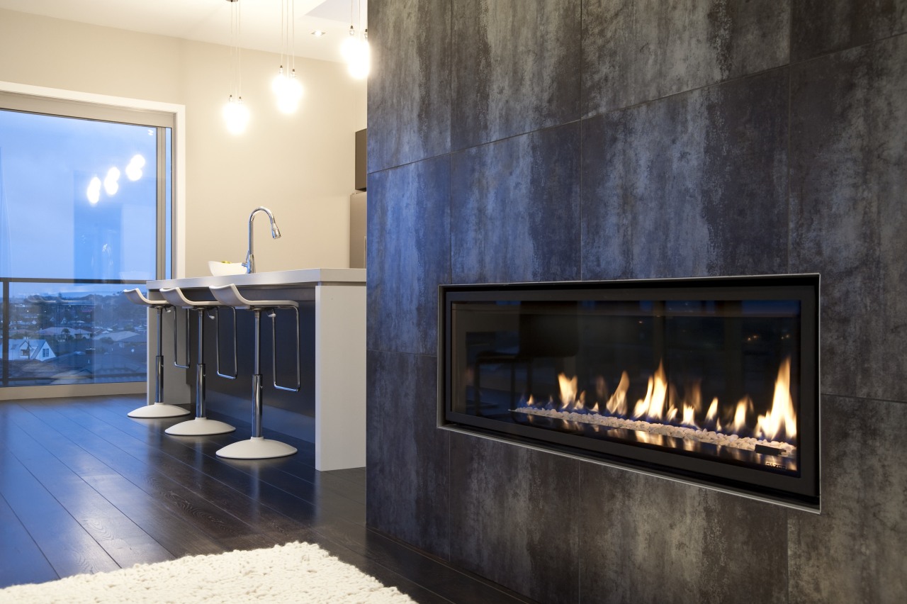 interior view of the New David Reid show fireplace, hearth, interior design, wood burning stove, black