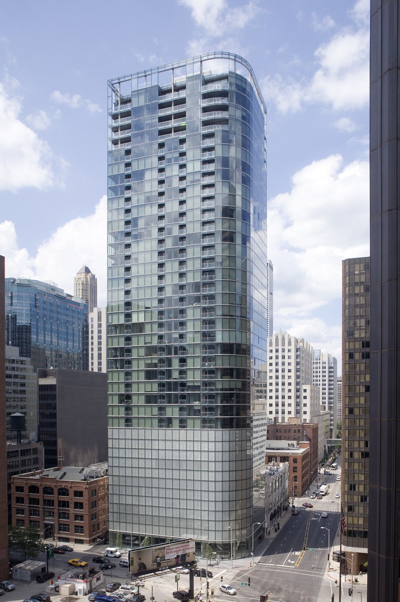 View of 600 North Fairbanks in Chicago. apartment, architecture, building, city, cityscape, commercial building, condominium, corporate headquarters, daytime, downtown, facade, headquarters, metropolis, metropolitan area, mixed use, neighbourhood, residential area, sky, skyline, skyscraper, tower, tower block, urban area, white, gray