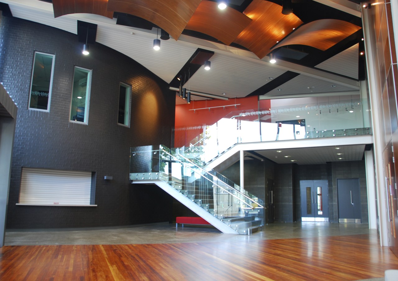 View of the new performing arts facility designed architecture, ceiling, glass, house, interior design, lobby, loft, real estate, stairs, gray, black