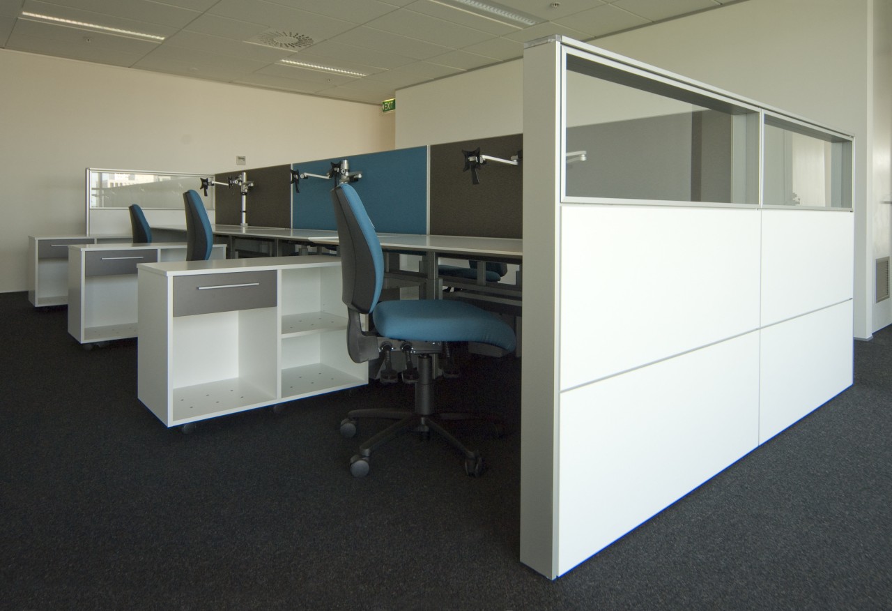 The office interiors at the Club Tower reflect desk, floor, furniture, office, product design, black, gray