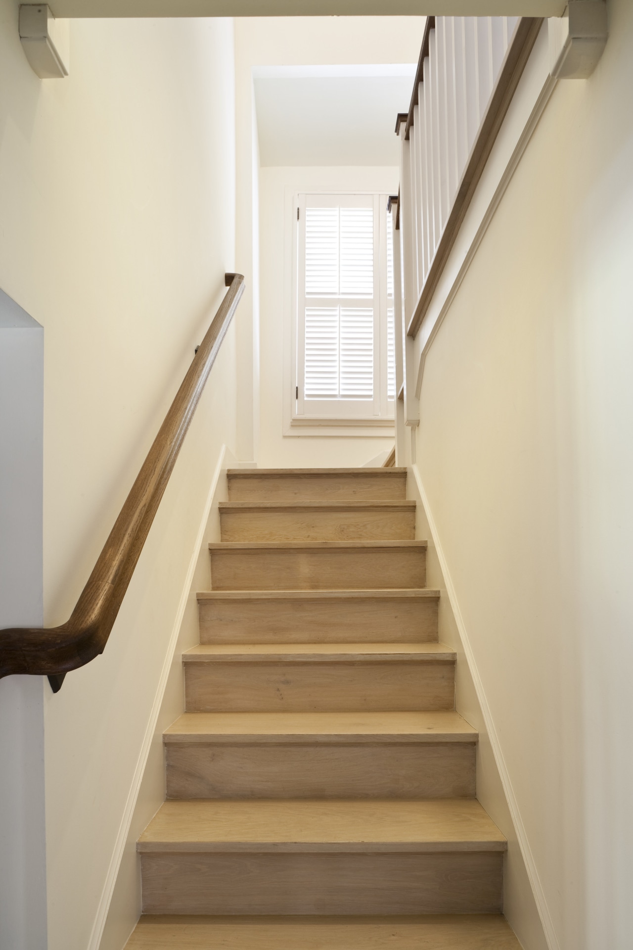Bottom of the stairway features timber railings &amp; daylighting, floor, handrail, hardwood, home, house, property, stairs, wood, white