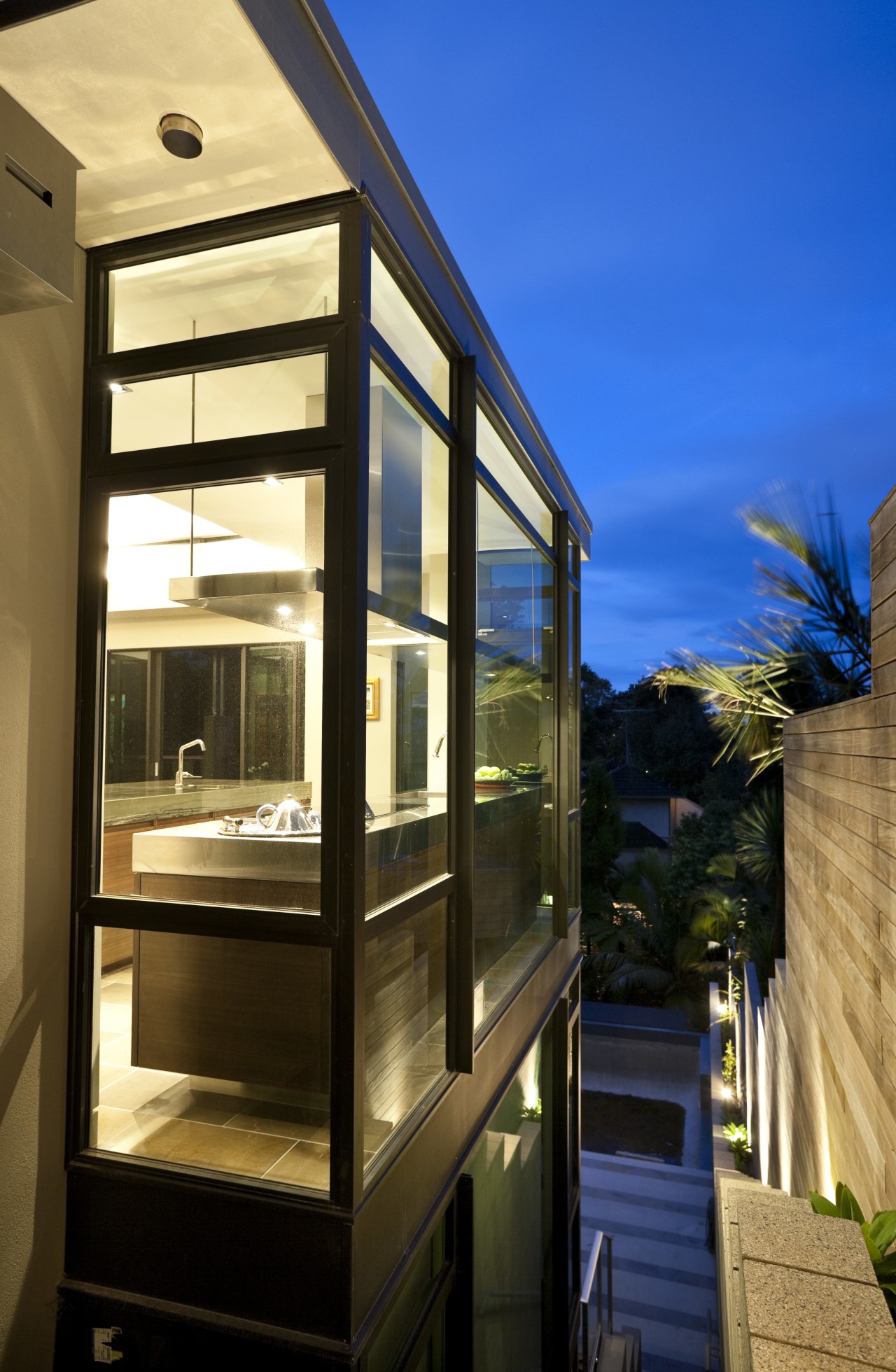 View of kitchen featuring american walnut base cabinets, architecture, home, house, property, real estate, window, brown, blue