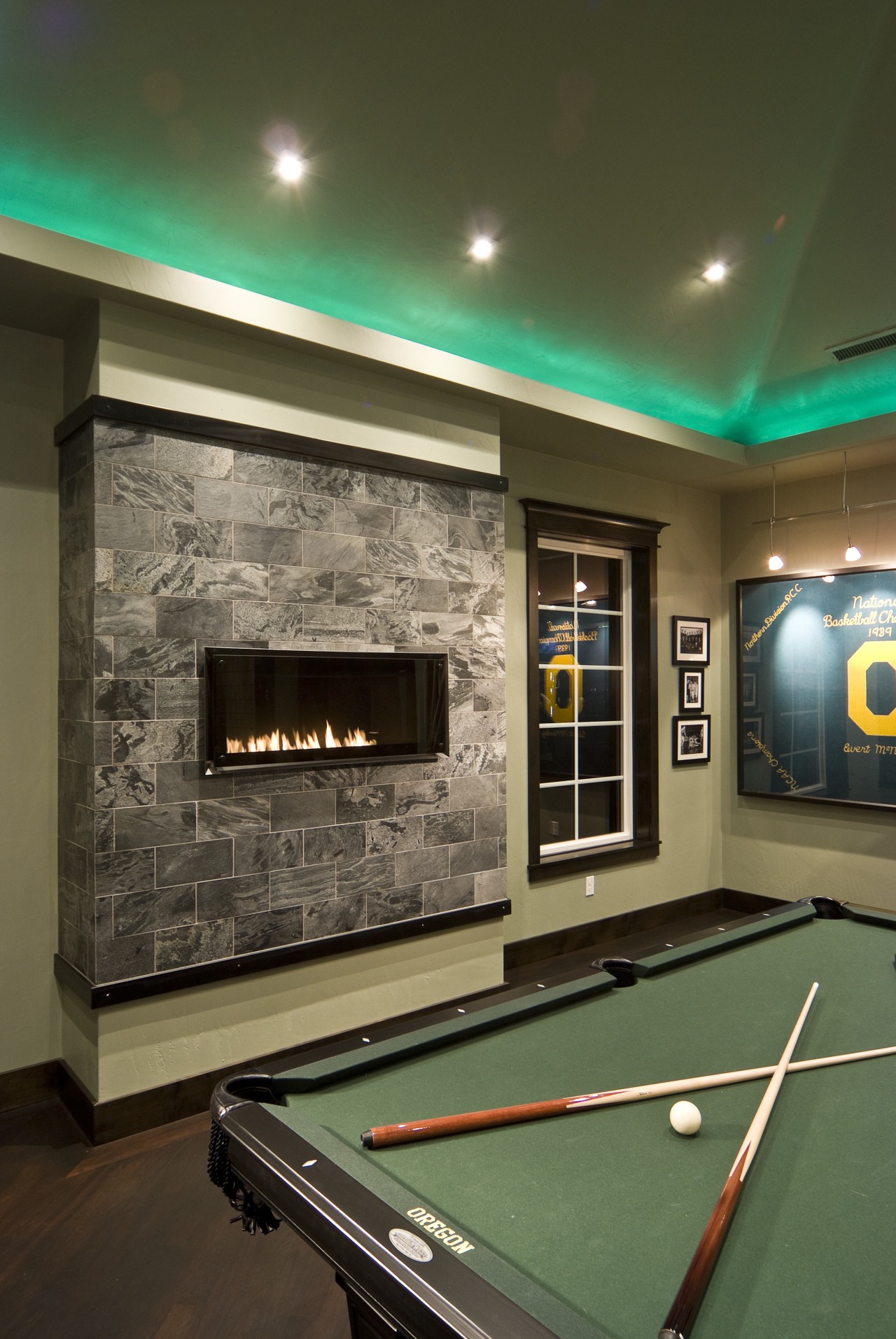 Director Dan Cooper of DC Fine Homes and billiard room, billiard table, ceiling, cue sports, english billiards, home, indoor games and sports, interior design, pool, recreation room, room, table, brown