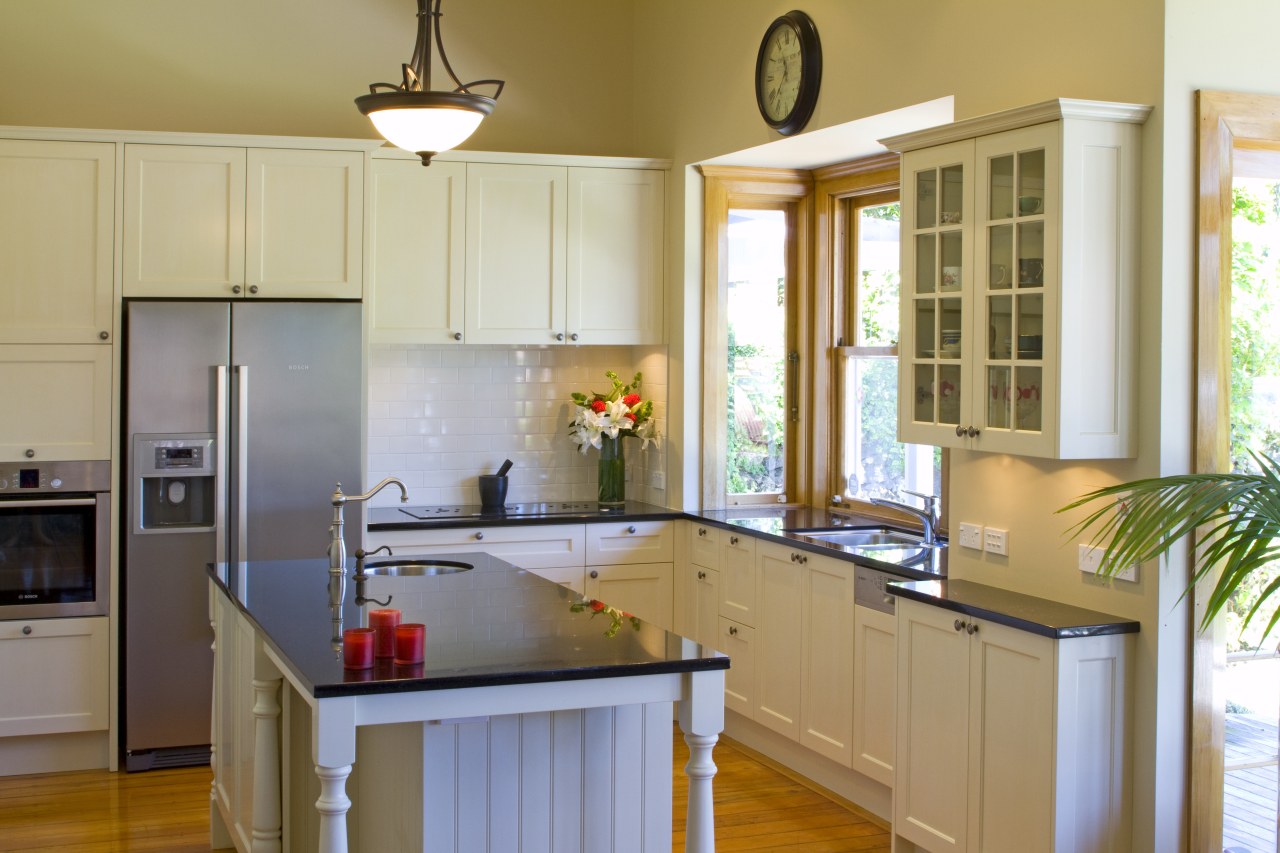 Details such as the round sink and traditionally cabinetry, countertop, cuisine classique, home, interior design, kitchen, real estate, room, window, gray, brown