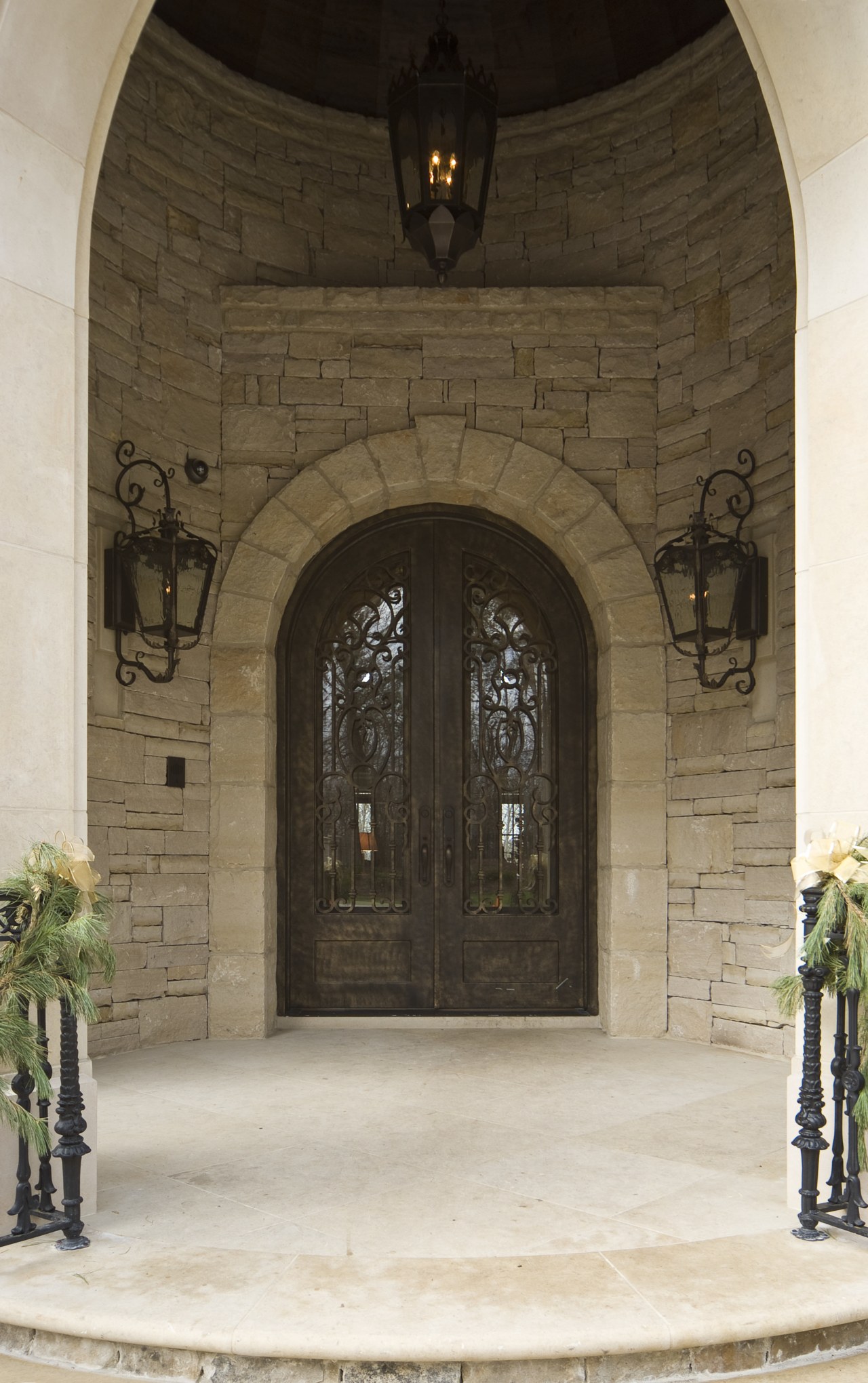 Castle Entries was contracted to provide a wrought arch, door, estate, iron, window, brown, white