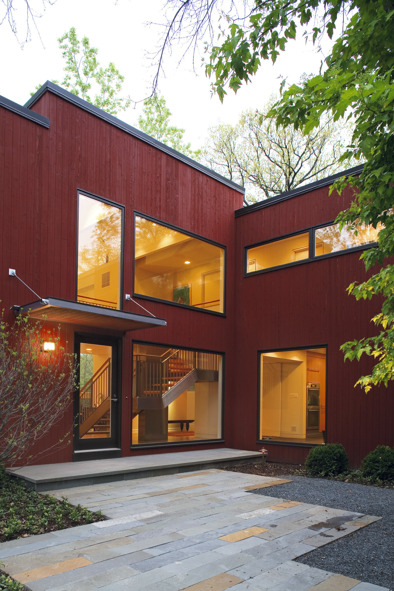 Entrance to this contemporary home architecture, building, elevation, facade, home, house, real estate, residential area, siding, window, red