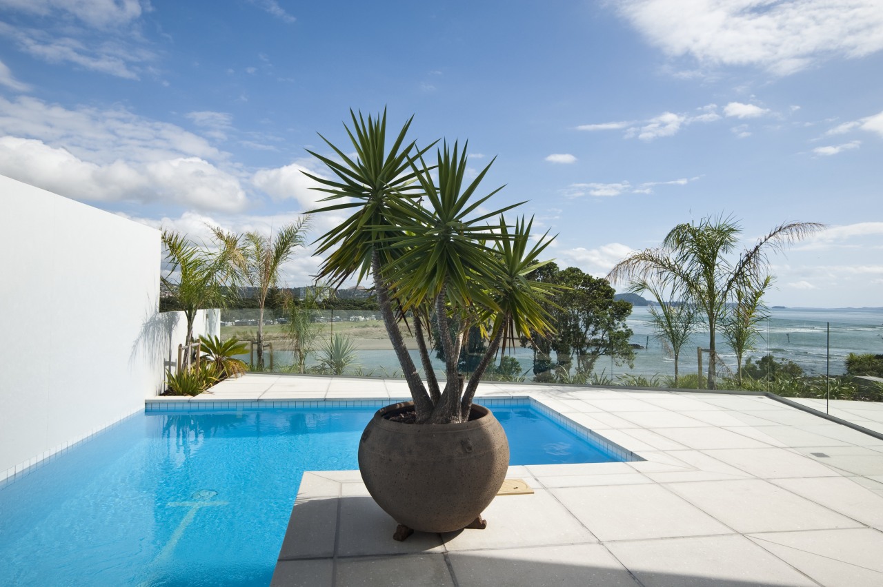 View of pool custom designed and installed by arecales, estate, leisure, majorelle blue, palm tree, plant, property, real estate, resort, sky, swimming pool, tree, tropics, vacation, villa, water, white, teal