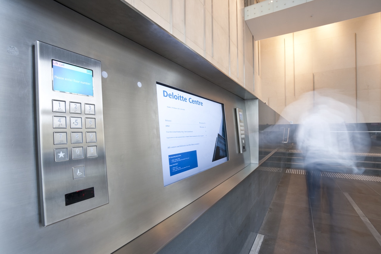 View of the elevators at the new Deloitte gray