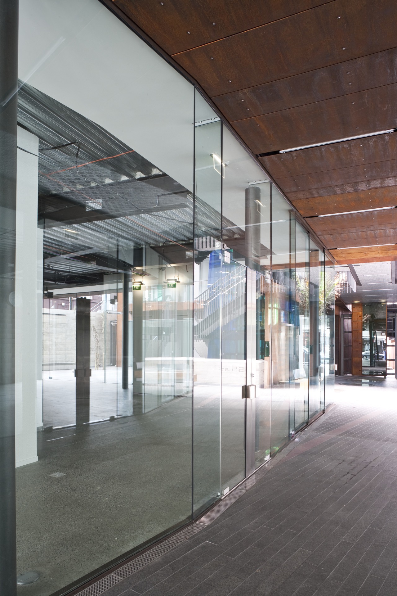 Exterior view of the Ironbank building which features architecture, building, daylighting, facade, glass, metropolitan area, structure, window, gray