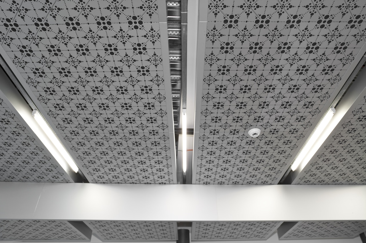 Anterior view of the Ironbank building which features angle, architecture, black and white, ceiling, daylighting, light, line, pattern, product design, gray