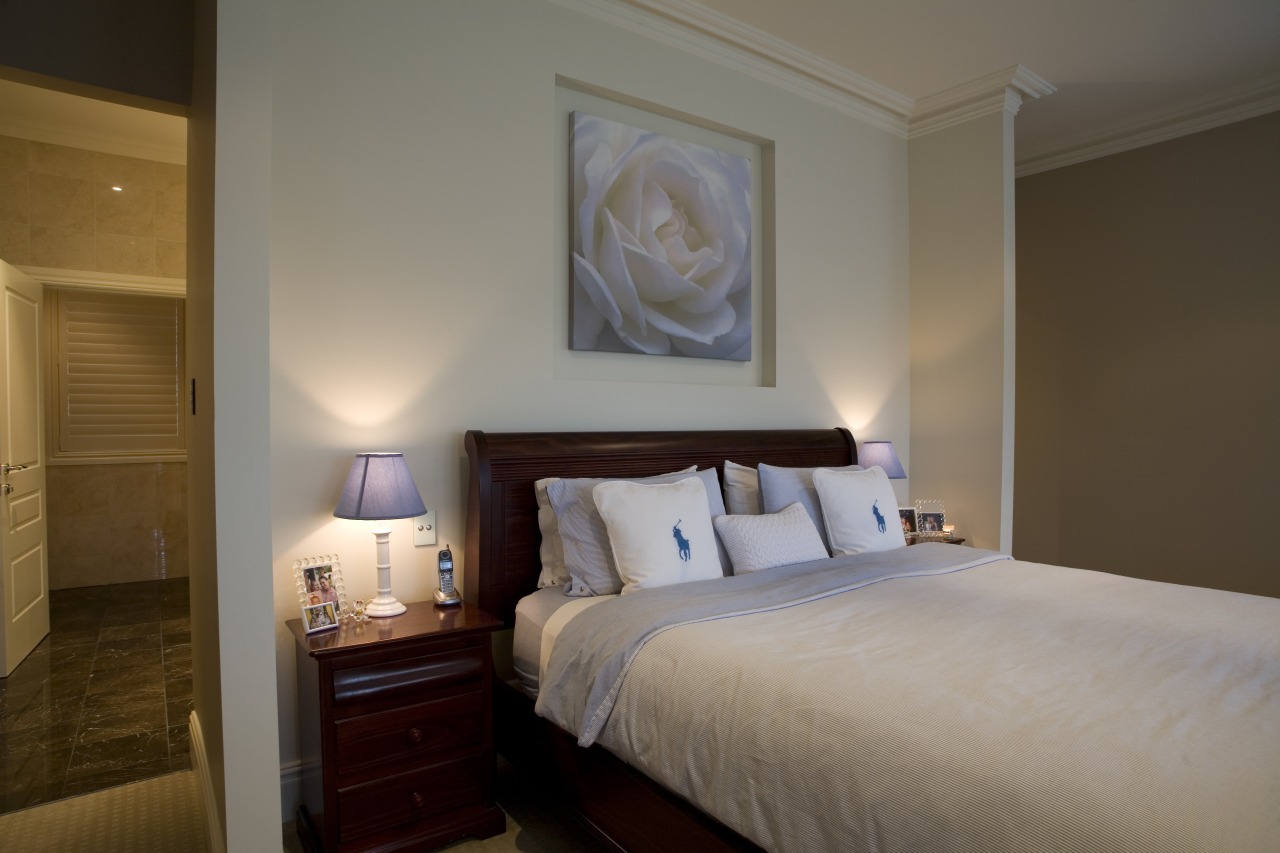 View of a bedroom with ensuite which features bed, bed frame, bedroom, ceiling, furniture, home, hotel, interior design, real estate, room, suite, window, gray, brown