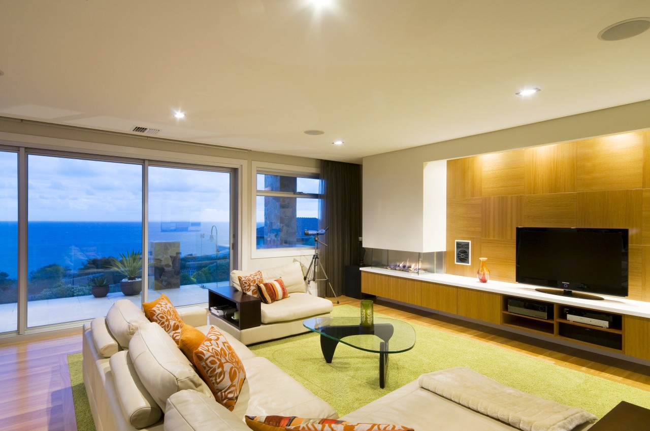 view of the lounge in this home designed ceiling, home, interior design, living room, property, real estate, room, orange