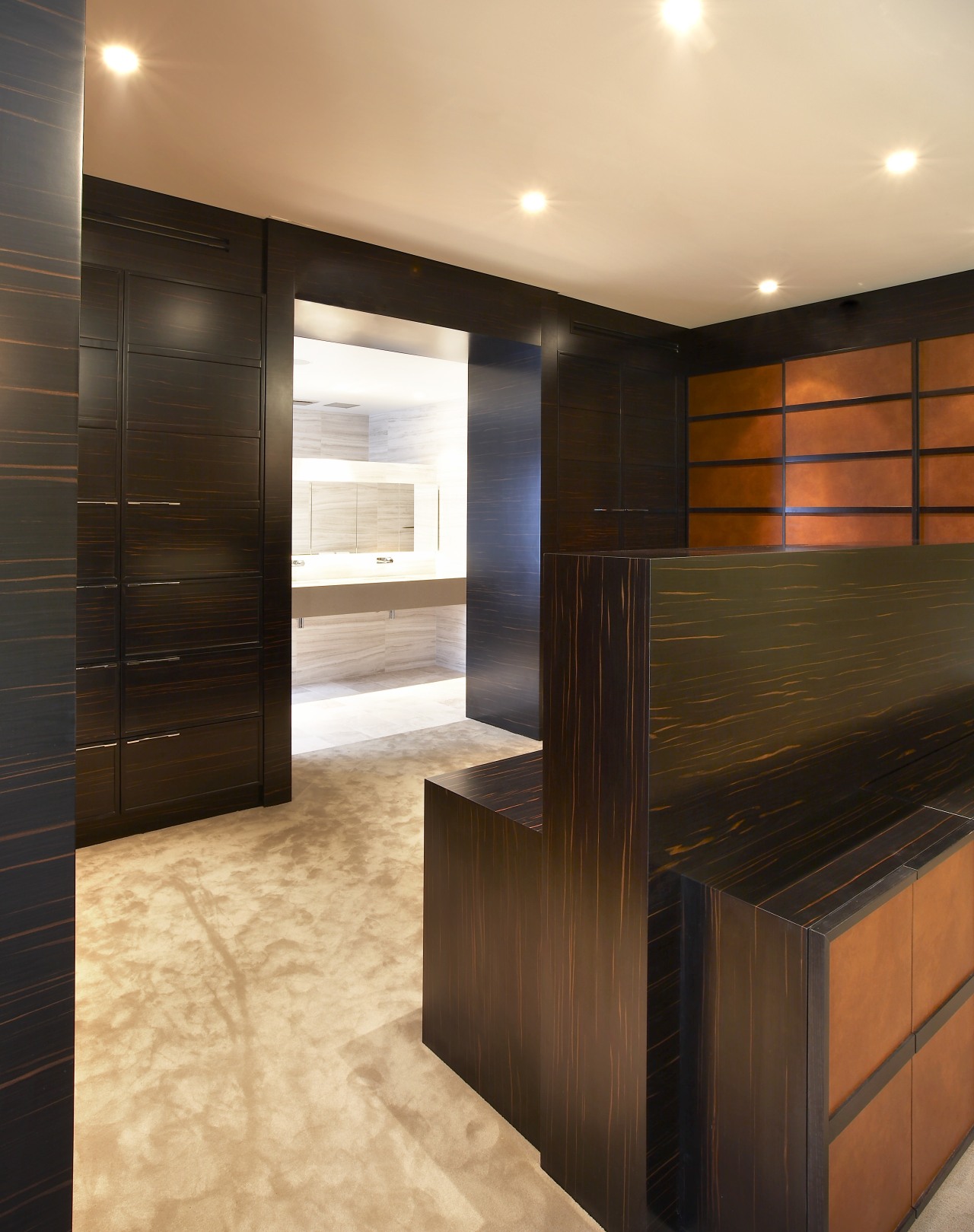 View of the bedroom which features wooden panelling architecture, cabinetry, floor, flooring, hardwood, interior design, laminate flooring, lobby, tile, wall, wood, wood flooring, wood stain, brown, orange