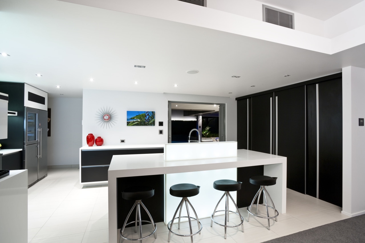 View of kitchen area which features an island interior design, kitchen, real estate, room, white