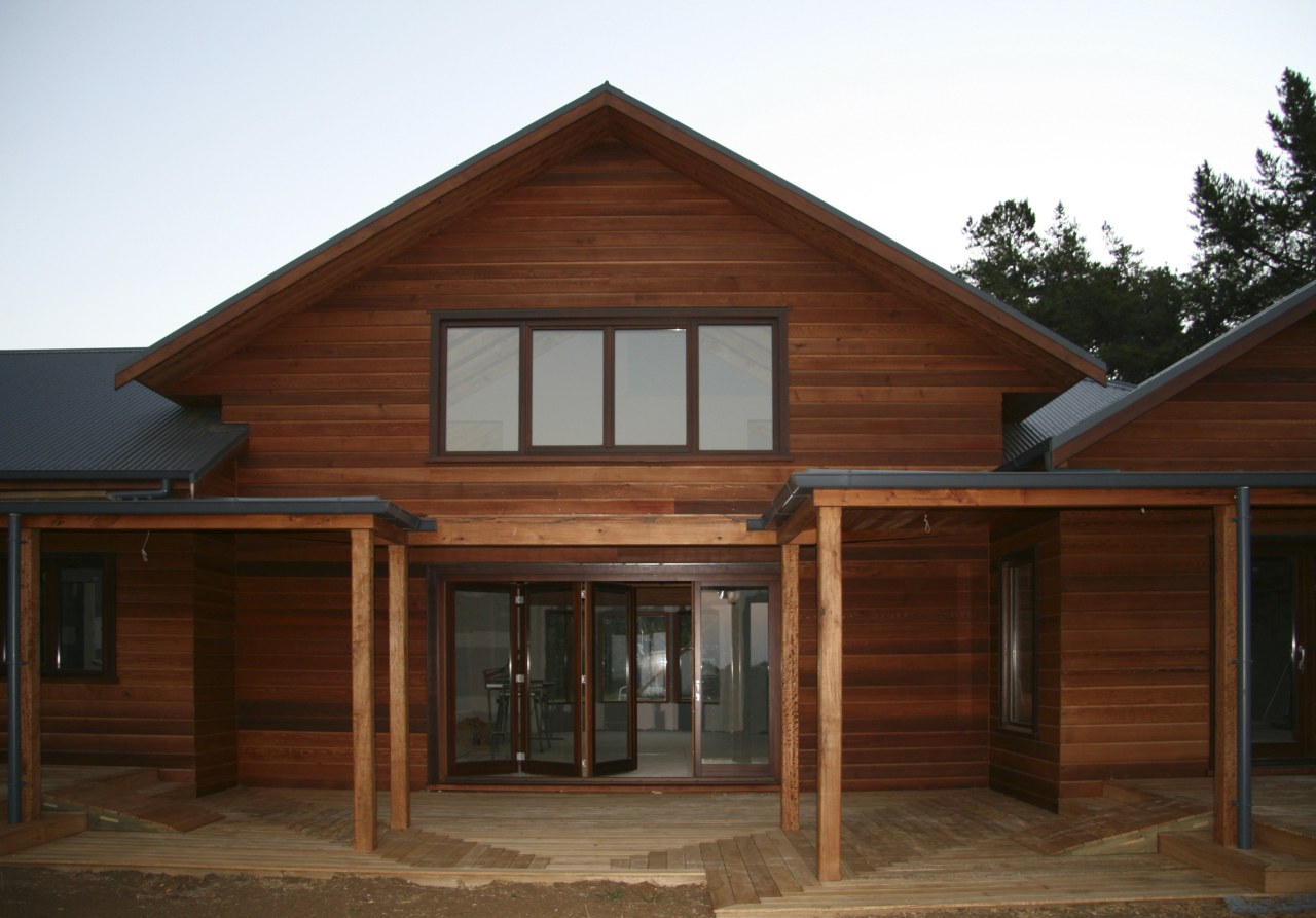 View of windows set into timber joinery by cottage, facade, home, house, log cabin, real estate, residential area, roof, siding, window, wood, wood stain, brown