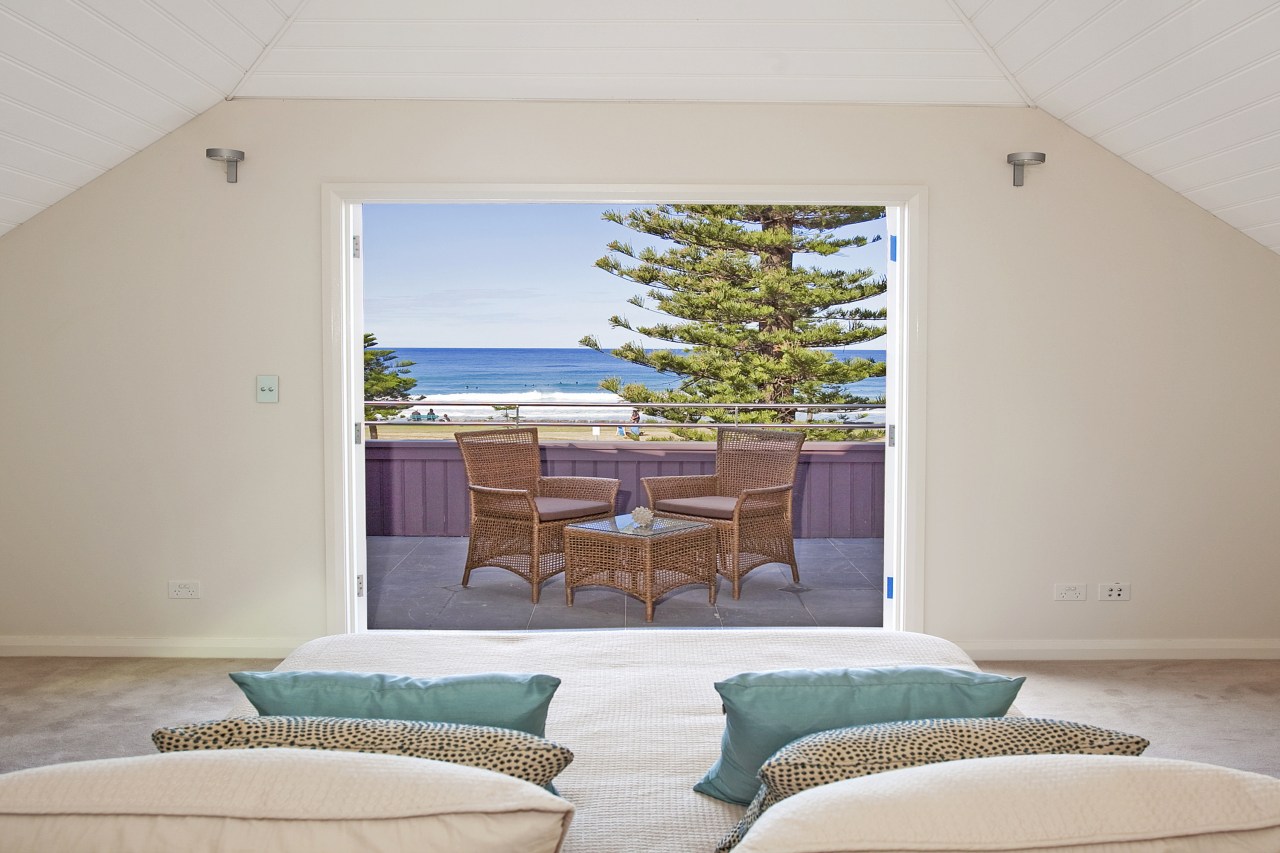 View of beachfront house with courtyard, formal living bedroom, estate, home, house, interior design, living room, property, real estate, room, suite, window, wood, gray