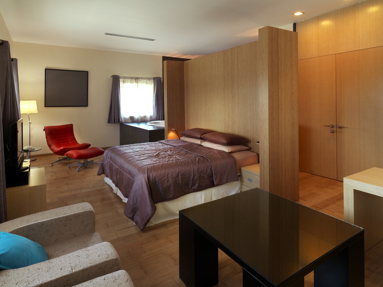 View of contemporary bedroom with wooden flooring and bedroom, interior design, real estate, room, suite, brown