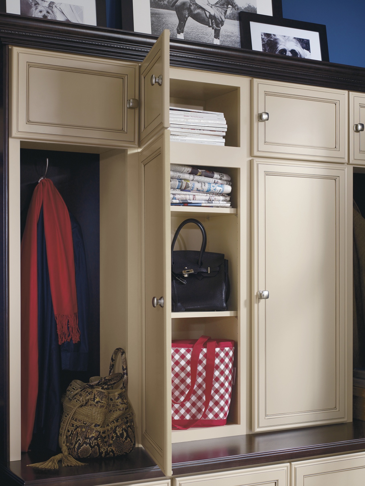 View of a bedroom which features cabinetry from cabinetry, closet, furniture, product, wardrobe, gray, black, brown