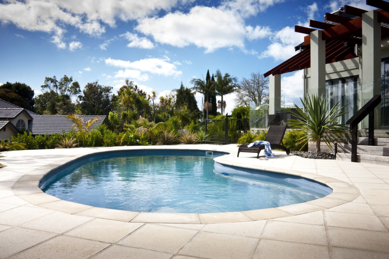 view of a pool area which features a estate, home, house, leisure, property, real estate, resort, swimming pool, villa, white