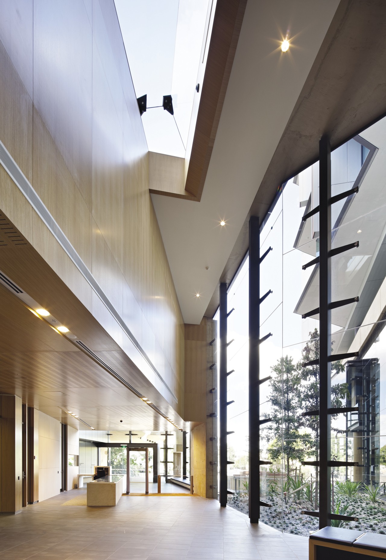 Large room with unique windows architecture, ceiling, condominium, daylighting, interior design, lobby, mixed use, real estate, gray, white