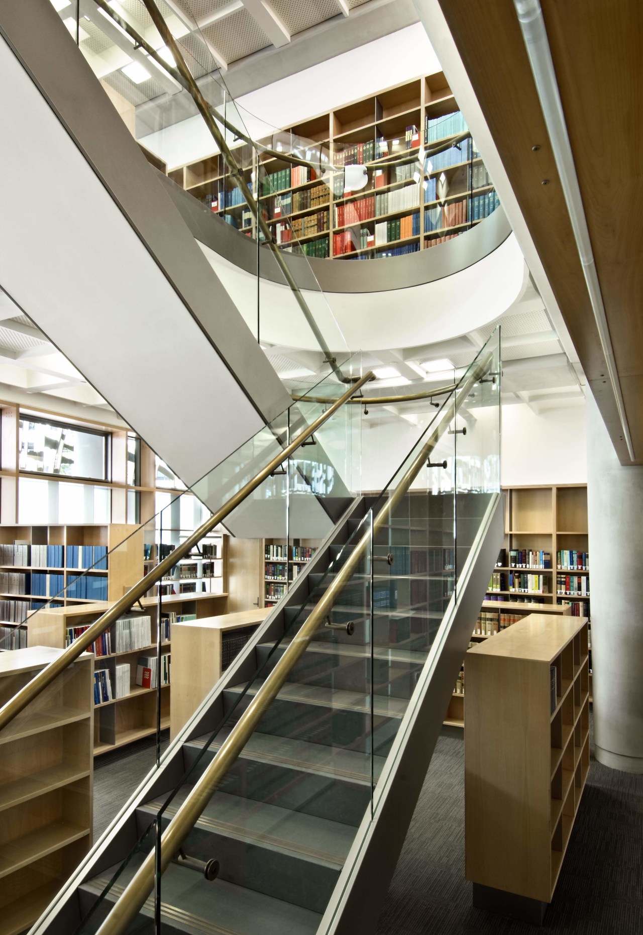 Interior view of the Supreme Court which features architecture, building, daylighting, glass, handrail, institution, interior design, library, public library, stairs, white