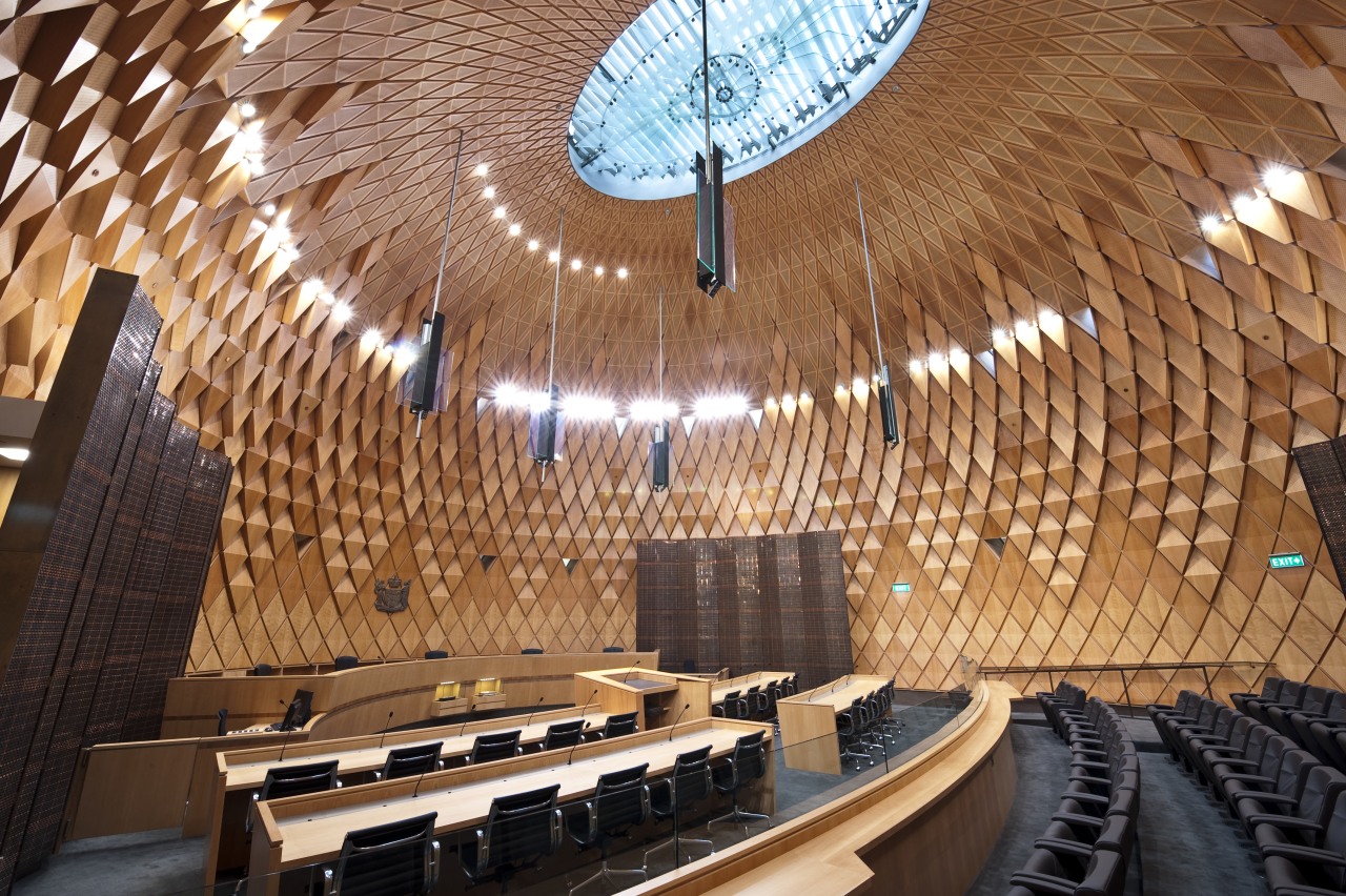 Interior view of the Supreme Court which features architecture, auditorium, ceiling, daylighting, interior design, performing arts center, wood, brown, orange