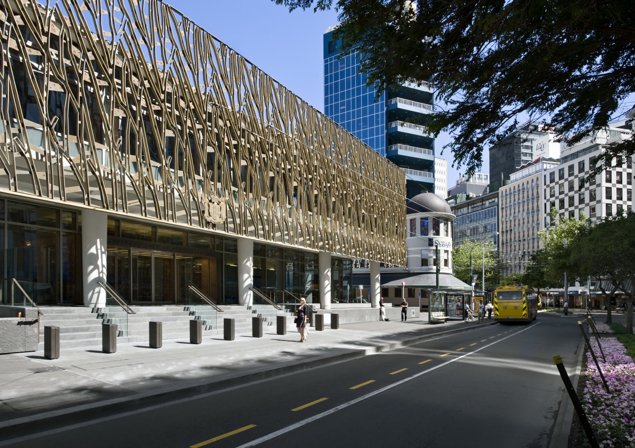 Exterior view of the Supreme Court which features architecture, building, city, condominium, daytime, downtown, facade, infrastructure, landmark, metropolis, metropolitan area, mixed use, neighbourhood, plaza, residential area, sky, skyscraper, structure, tree, urban area, urban design, black