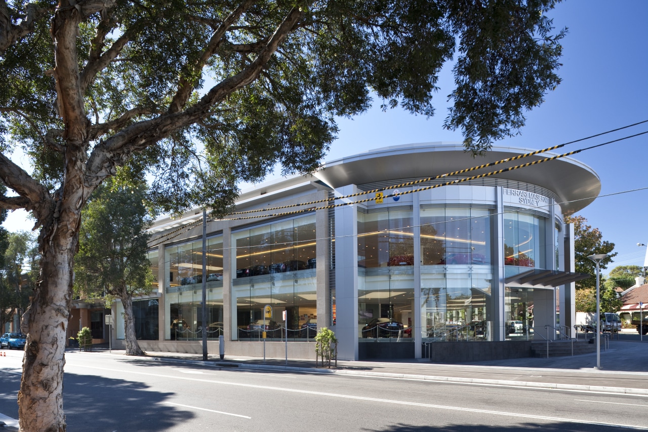 Ferrari showroom architecture, building, commercial building, corporate headquarters, facade, mixed use, real estate, tree, black, gray