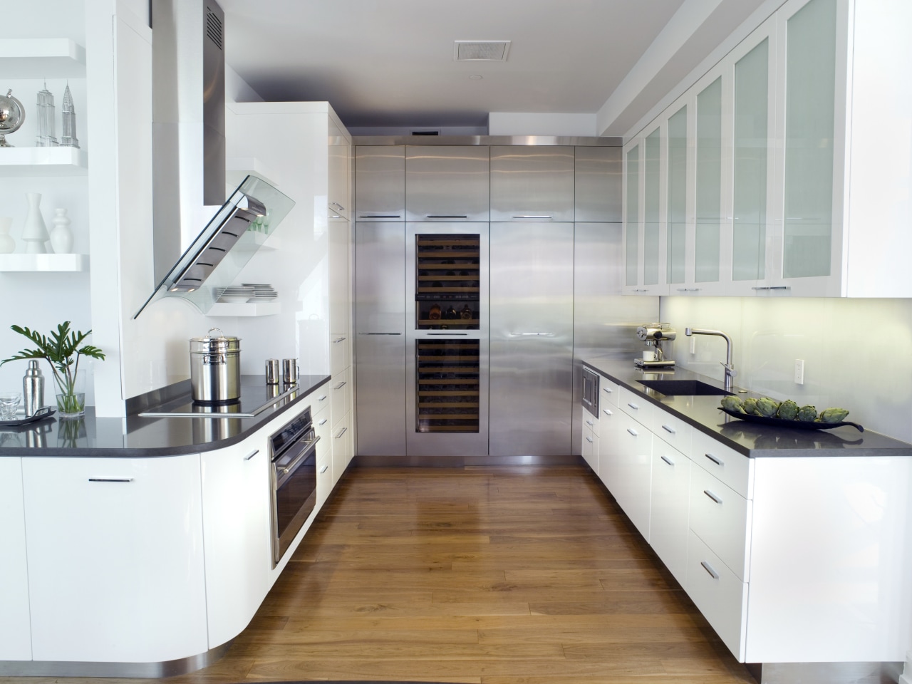 View of contemporary apartment kitchen which features timber cabinetry, countertop, cuisine classique, floor, home appliance, interior design, kitchen, room, white, gray