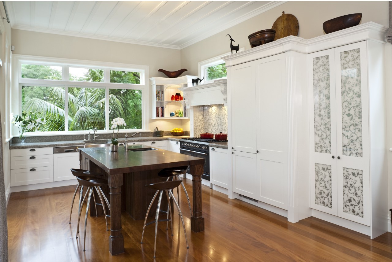 View of a kitchen designed by Nicola Cumming cabinetry, countertop, floor, flooring, hardwood, home, interior design, kitchen, real estate, room, window, wood, wood flooring, gray