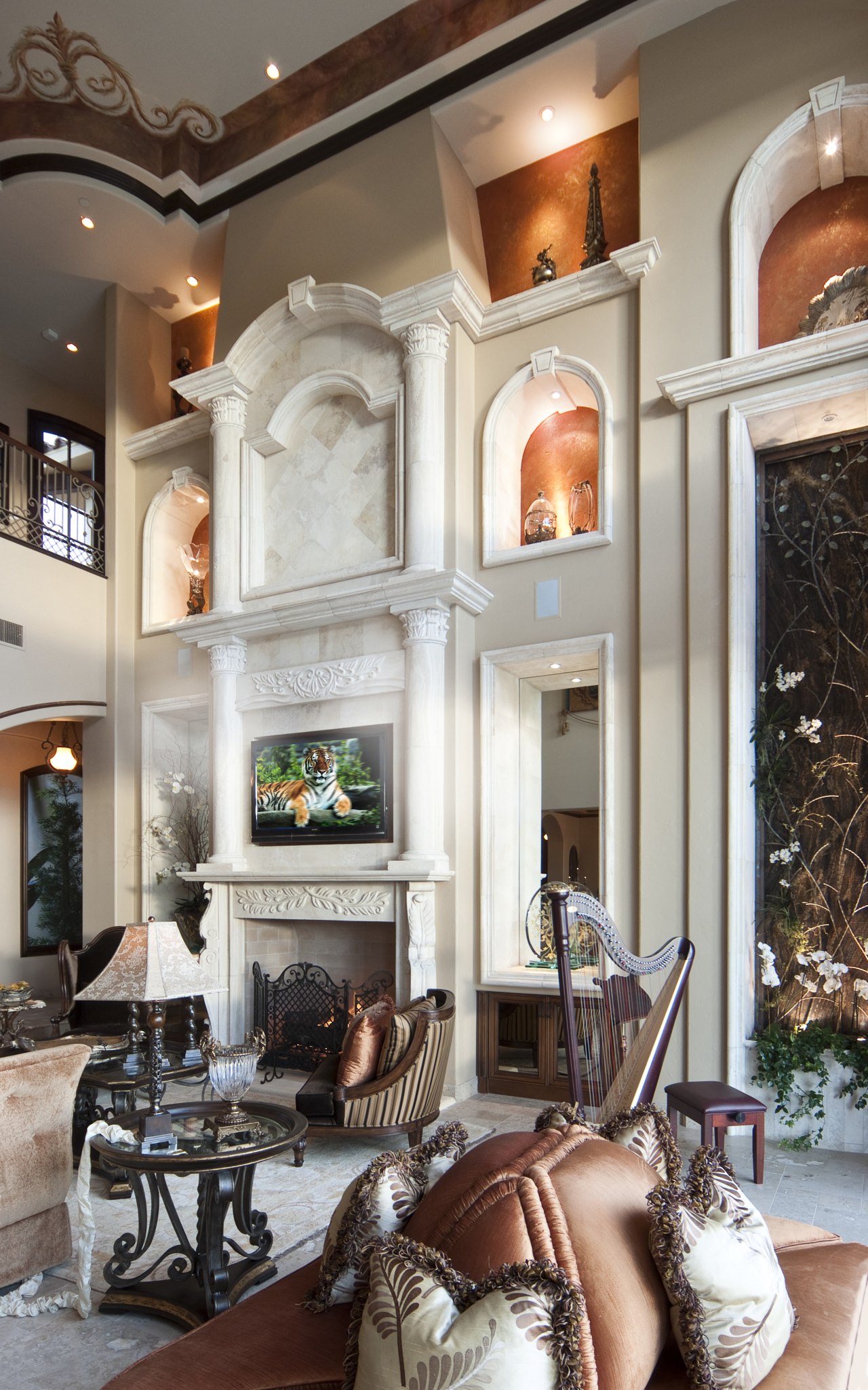 Lounge featuring a moulded wall with tv, high ceiling, furniture, home, interior design, living room, room, gray